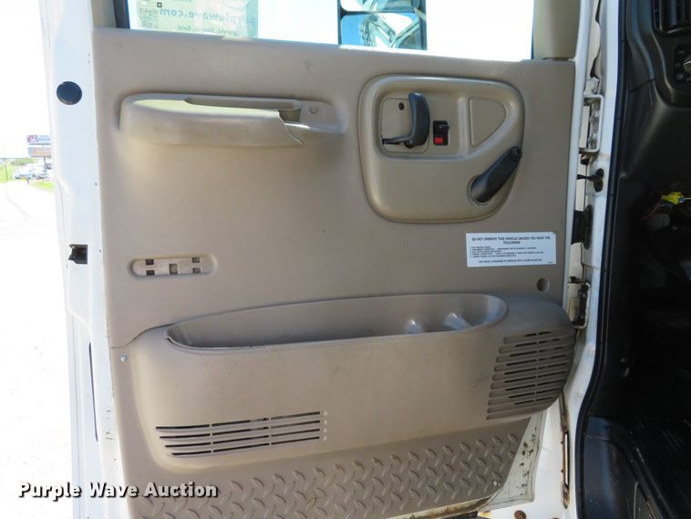 image for item DH1149 2006 GMC C8500  flatbed truck with crane