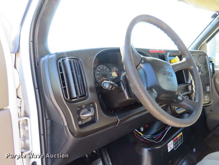 image for item DH1149 2006 GMC C8500  flatbed truck with crane