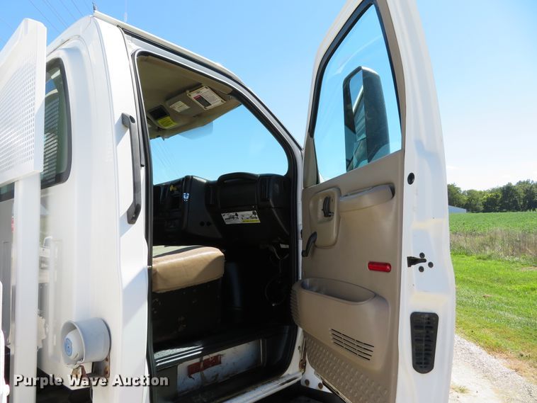 image for item DH1149 2006 GMC C8500  flatbed truck with crane