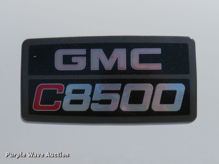 image for item DH1149 2006 GMC C8500  flatbed truck with crane