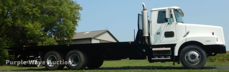 image for item FT9131 1996 Volvo WG  rollback truck