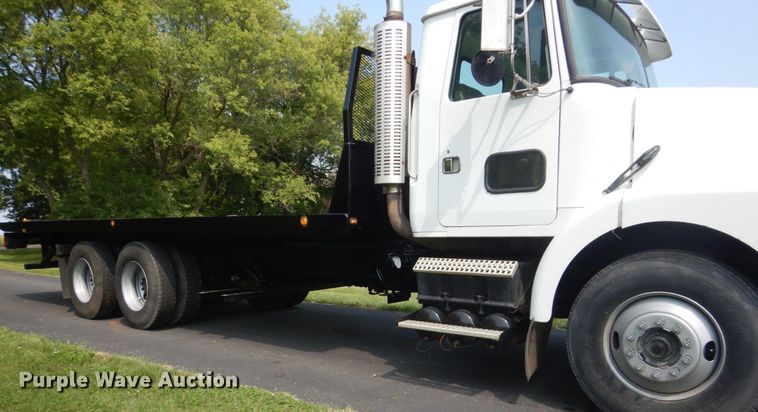 image for item FT9131 1996 Volvo WG  rollback truck