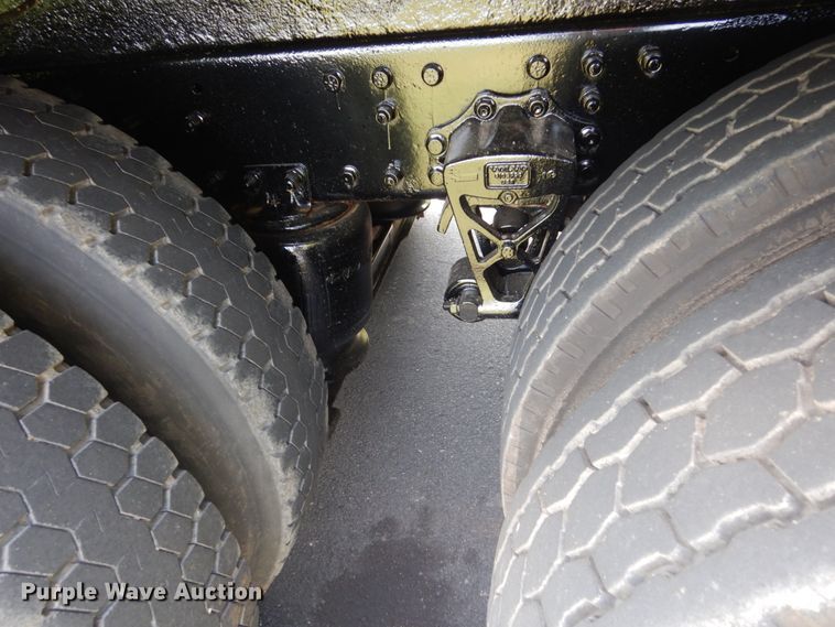 image for item FT9131 1996 Volvo WG  rollback truck