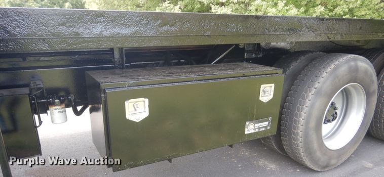 image for item FT9131 1996 Volvo WG  rollback truck