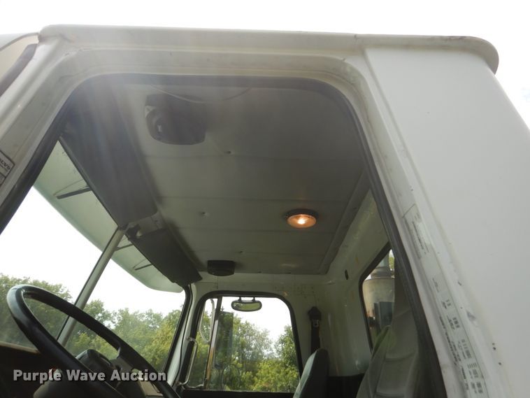 image for item FT9131 1996 Volvo WG  rollback truck