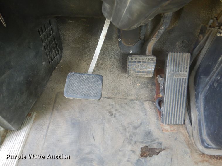 image for item FT9131 1996 Volvo WG  rollback truck