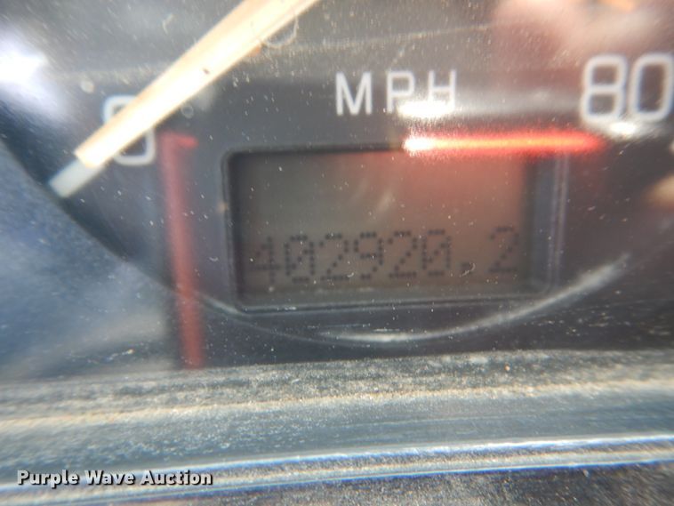 image for item FT9131 1996 Volvo WG  rollback truck