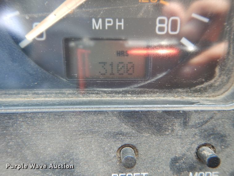 image for item FT9131 1996 Volvo WG  rollback truck