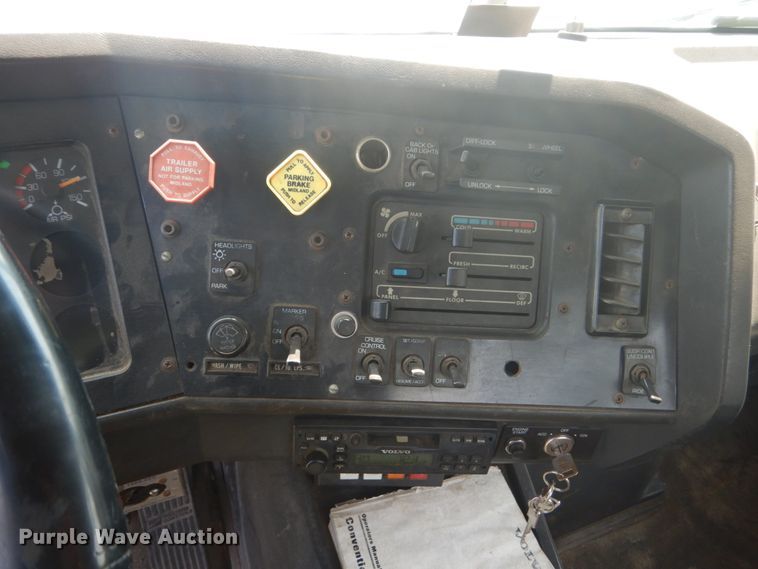 image for item FT9131 1996 Volvo WG  rollback truck