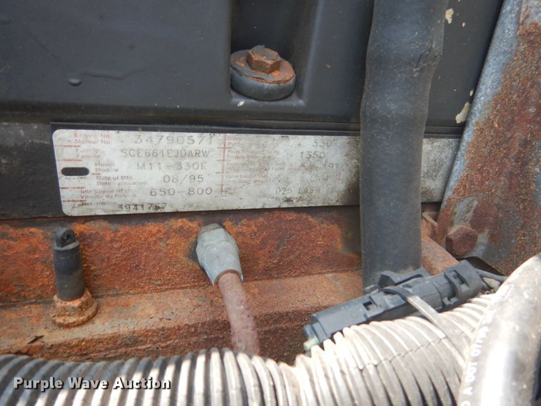 image for item FT9131 1996 Volvo WG  rollback truck