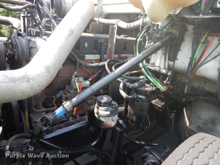 image for item FT9131 1996 Volvo WG  rollback truck