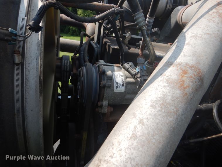 image for item FT9131 1996 Volvo WG  rollback truck