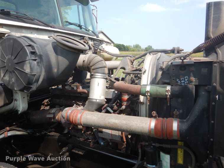 image for item FT9131 1996 Volvo WG  rollback truck