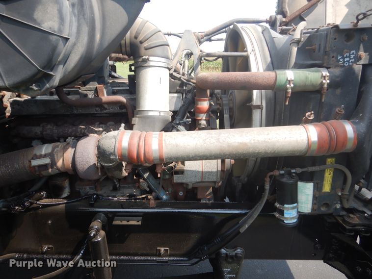 image for item FT9131 1996 Volvo WG  rollback truck