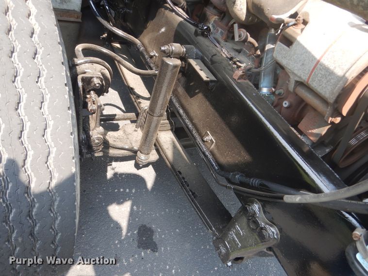 image for item FT9131 1996 Volvo WG  rollback truck