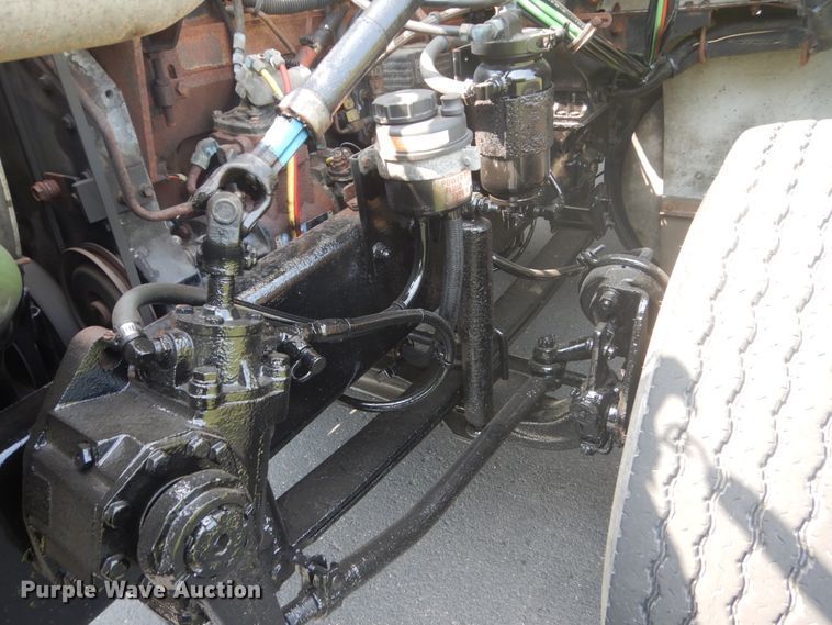 image for item FT9131 1996 Volvo WG  rollback truck