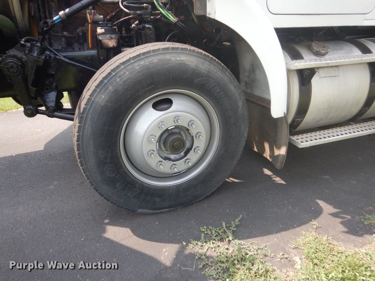 image for item FT9131 1996 Volvo WG  rollback truck