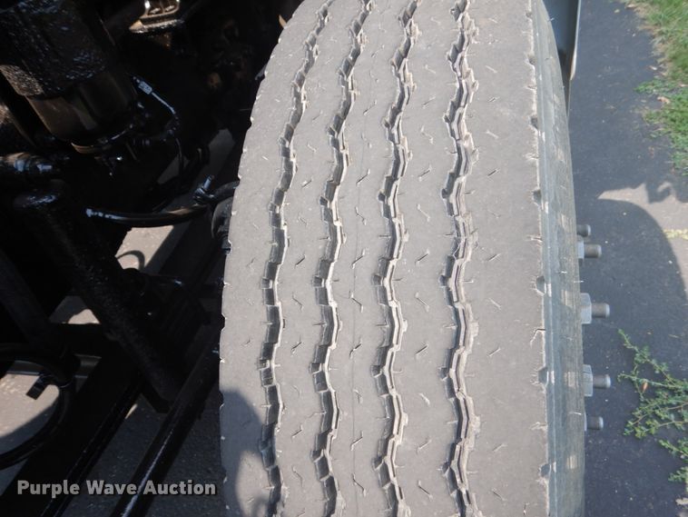 image for item FT9131 1996 Volvo WG  rollback truck