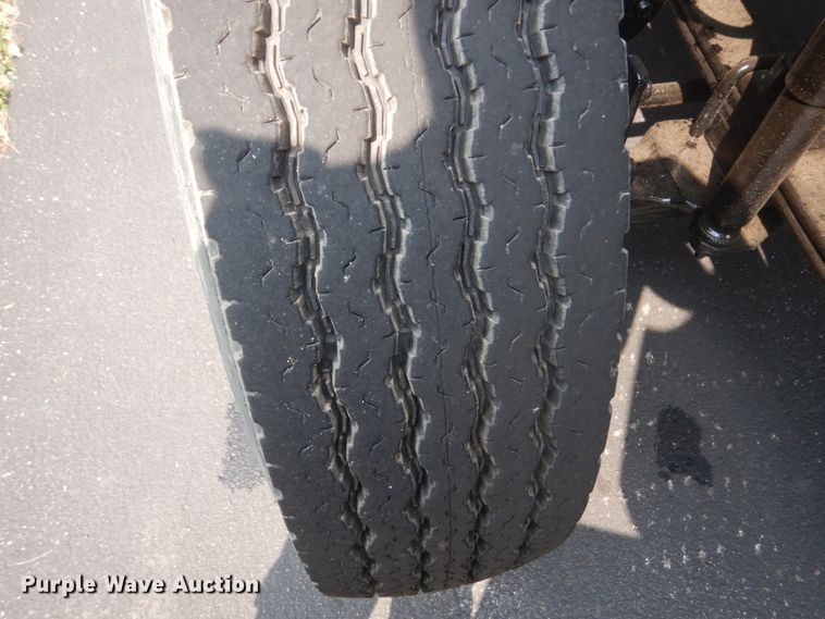 image for item FT9131 1996 Volvo WG  rollback truck