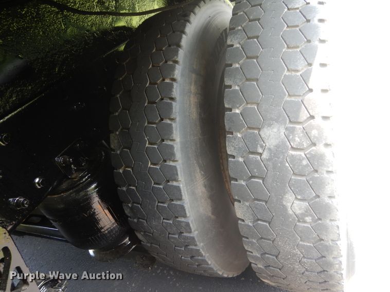 image for item FT9131 1996 Volvo WG  rollback truck