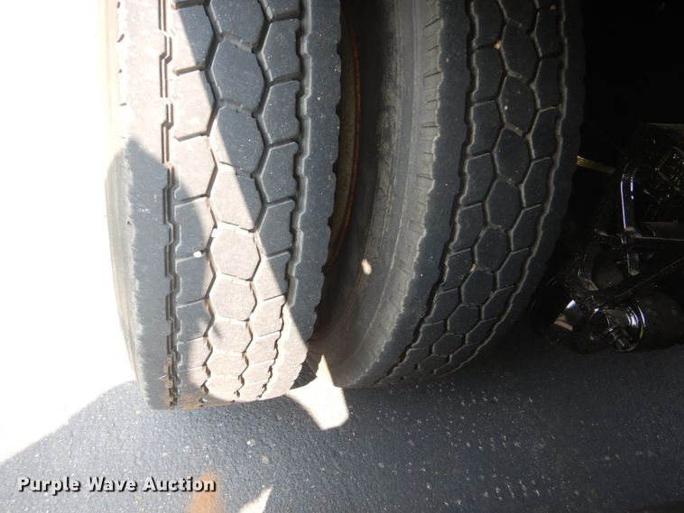 image for item FT9131 1996 Volvo WG  rollback truck