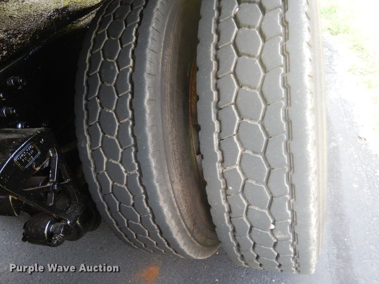 image for item FT9131 1996 Volvo WG  rollback truck