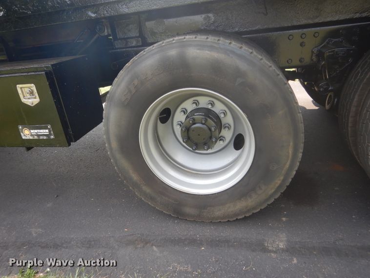 image for item FT9131 1996 Volvo WG  rollback truck