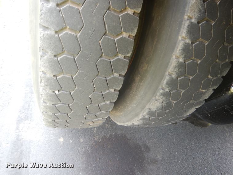 image for item FT9131 1996 Volvo WG  rollback truck