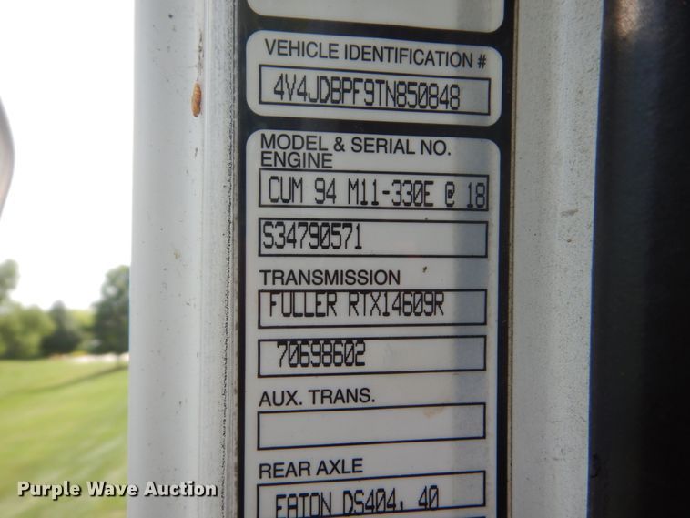 image for item FT9131 1996 Volvo WG  rollback truck