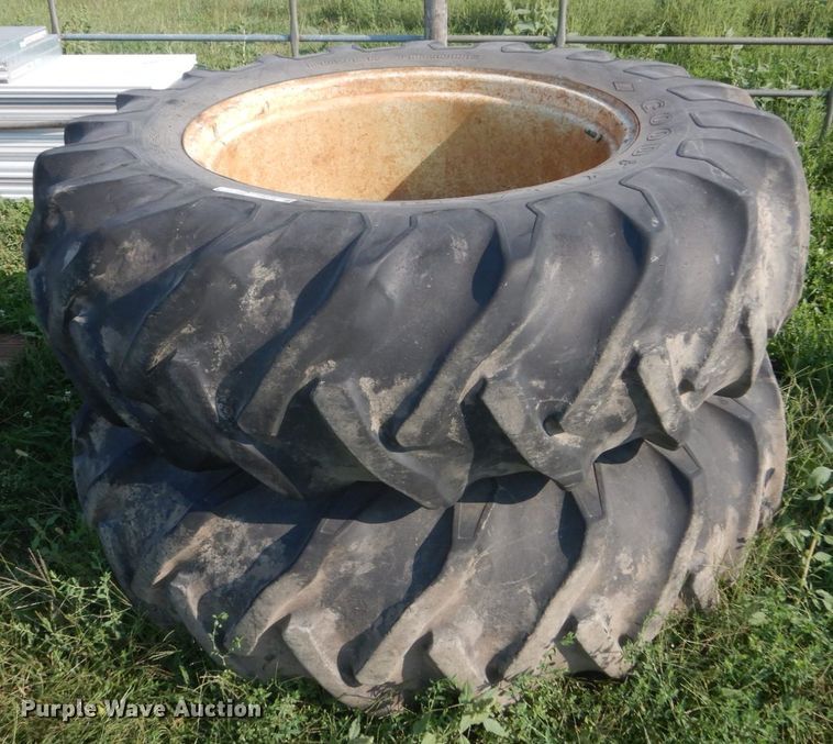 image for item FT9175 (2) Goodyear 18.4-34 tires and wheels