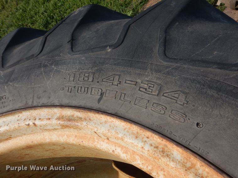 image for item FT9175 (2) Goodyear 18.4-34 tires and wheels