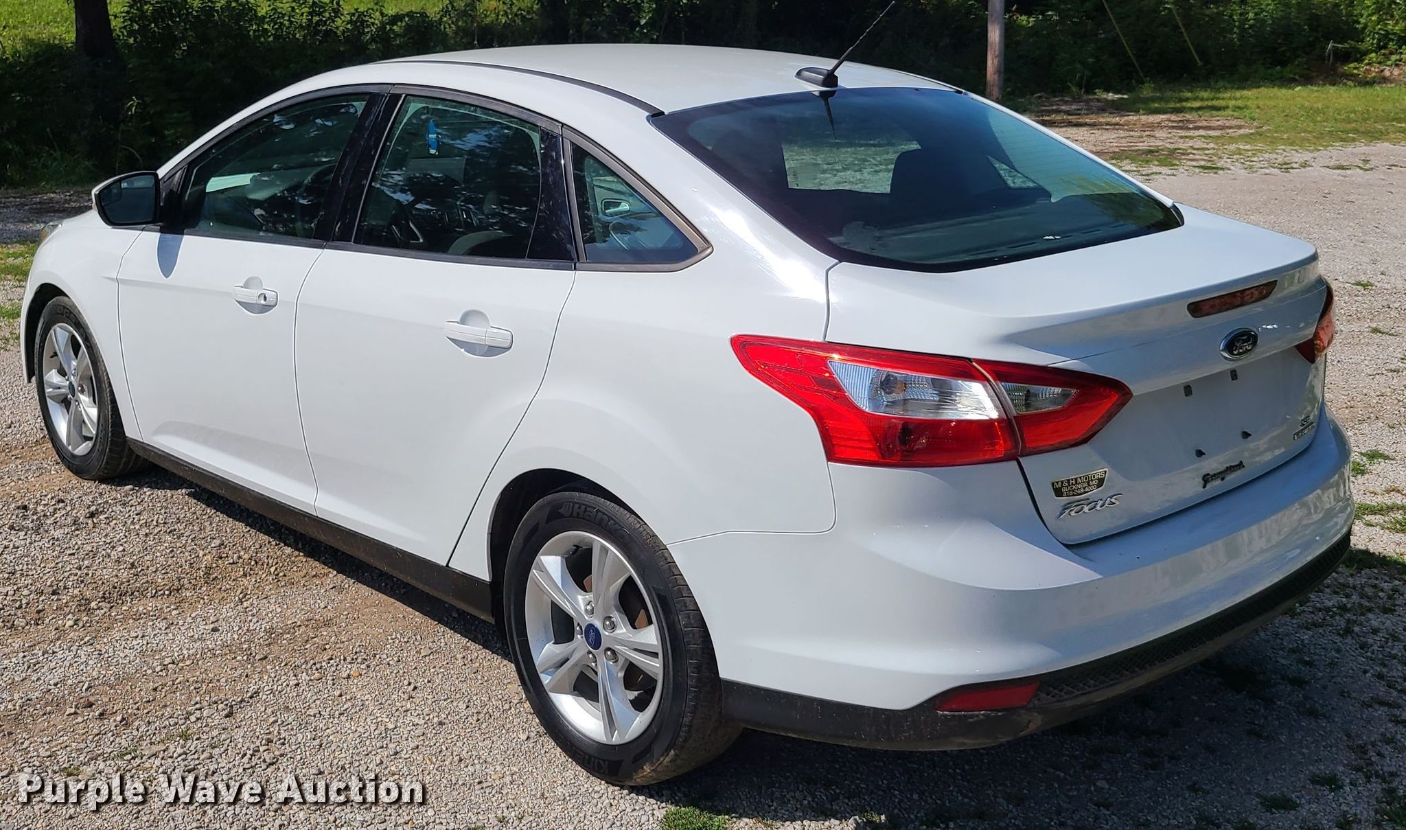 2014 Ford Focus in Buckner, MO Item GY9554 sold Purple Wave