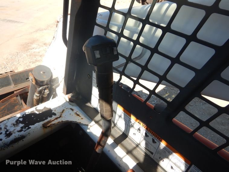 image for item GR9745 2004 Bobcat S250  skid steer loader