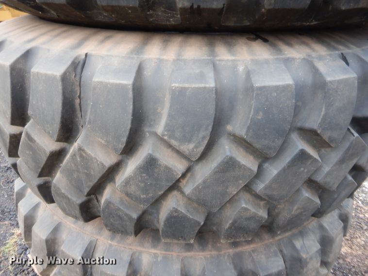 image for item HB9490 (4) 16.00R20 tires and wheels