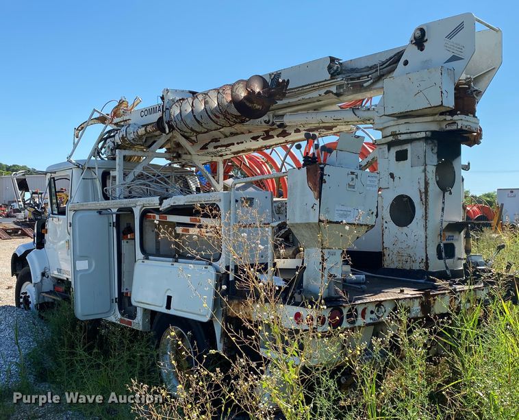 image for item HG9165 1997 International 4700  digger derrick truck