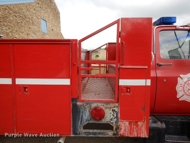 image for item DI7669 1984 GMC 7000  utility truck