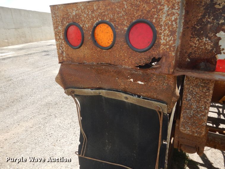 image for item FT9012 1999 Trail King TK54BDU bottom dump trailer