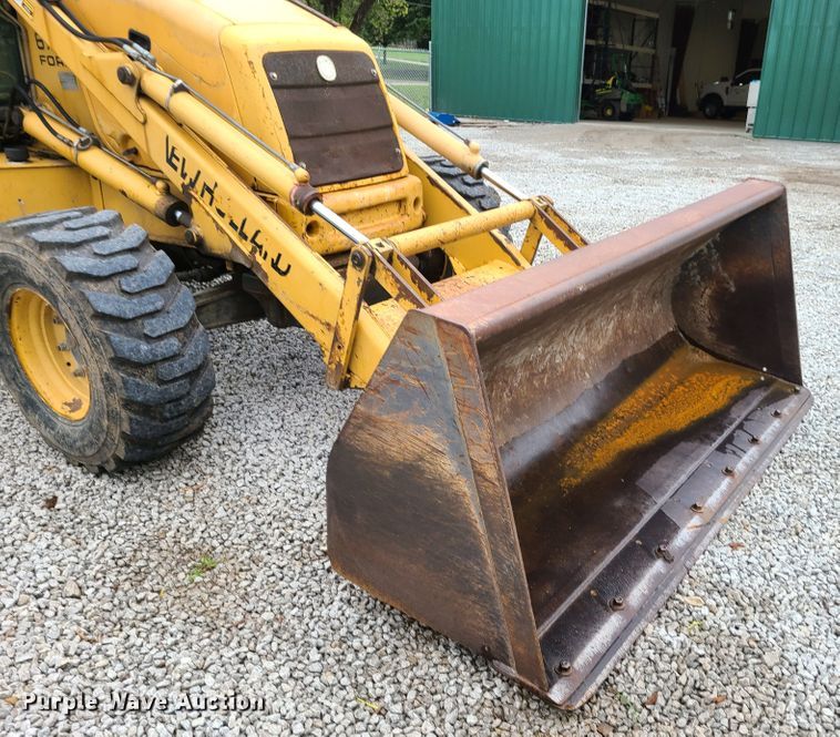 image for item GO9357 New Holland 675E  backhoe