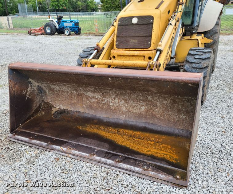 image for item GO9357 New Holland 675E  backhoe