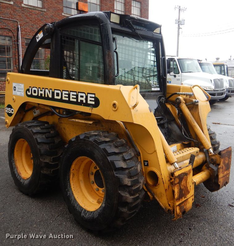 image for item HA9624 1999 John Deere 250  skid steer loader