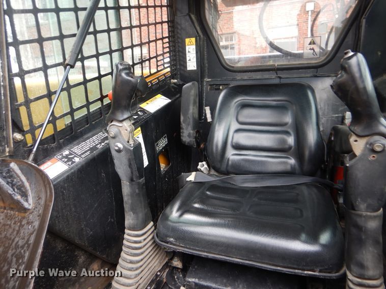 image for item HA9624 1999 John Deere 250  skid steer loader