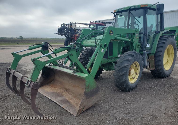 image for item DE4489 1997 John Deere 6400  MFWD tractor