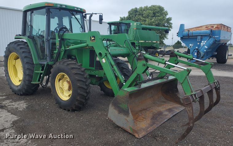 image for item DE4489 1997 John Deere 6400  MFWD tractor