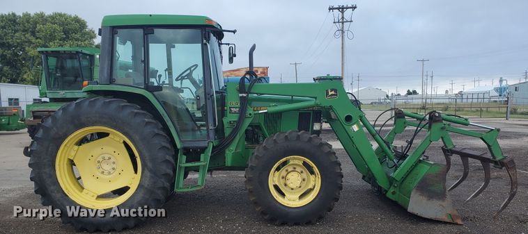 image for item DE4489 1997 John Deere 6400  MFWD tractor