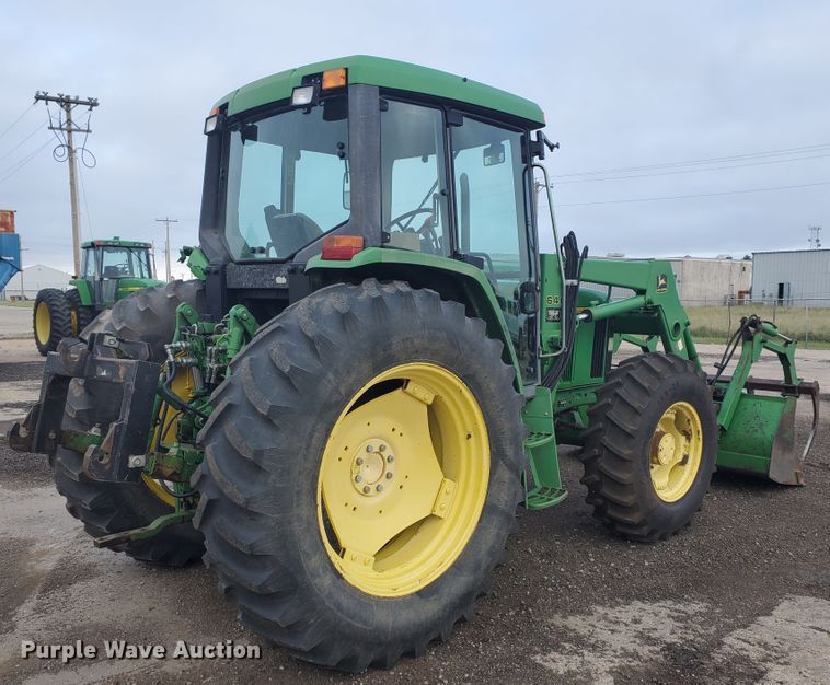 image for item DE4489 1997 John Deere 6400  MFWD tractor