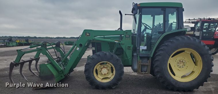 image for item DE4489 1997 John Deere 6400  MFWD tractor