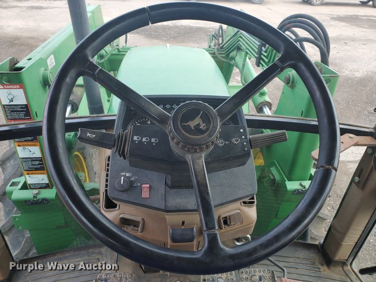 image for item DE4489 1997 John Deere 6400  MFWD tractor