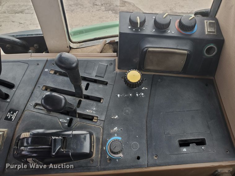 image for item DE4489 1997 John Deere 6400  MFWD tractor