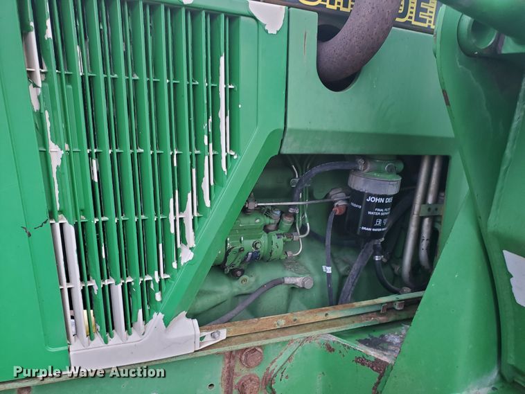 image for item DE4489 1997 John Deere 6400  MFWD tractor