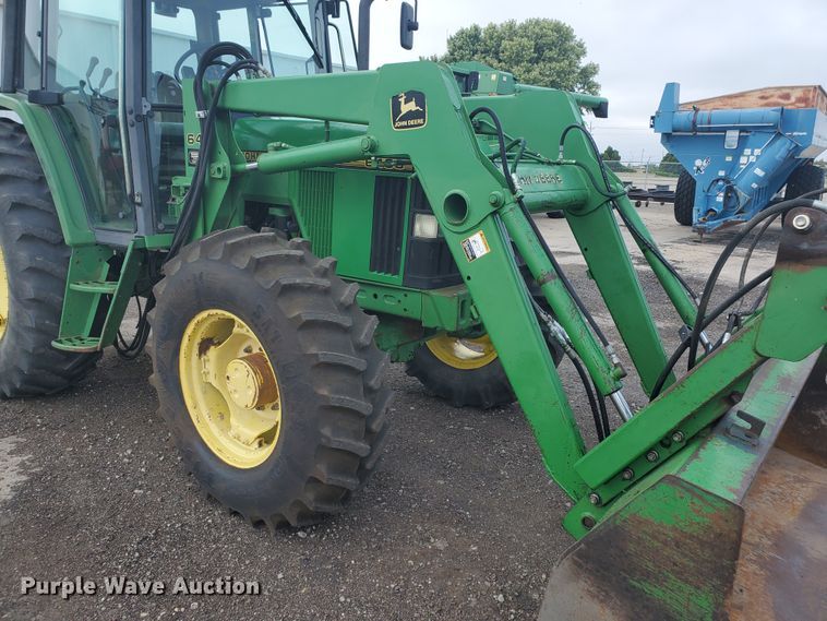 image for item DE4489 1997 John Deere 6400  MFWD tractor